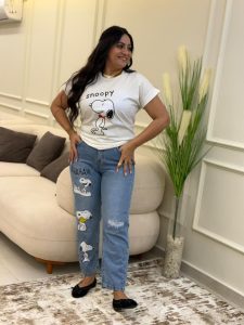 Cutting Jeans with a Snoopy Print Pants - Image 2