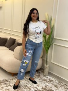 Cutting Jeans with a Snoopy Print Pants - Image 4