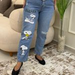 Cutting Jeans with a Snoopy Print Pants